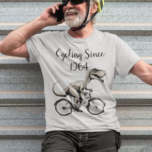 a dinosaur on a bike t-shirt