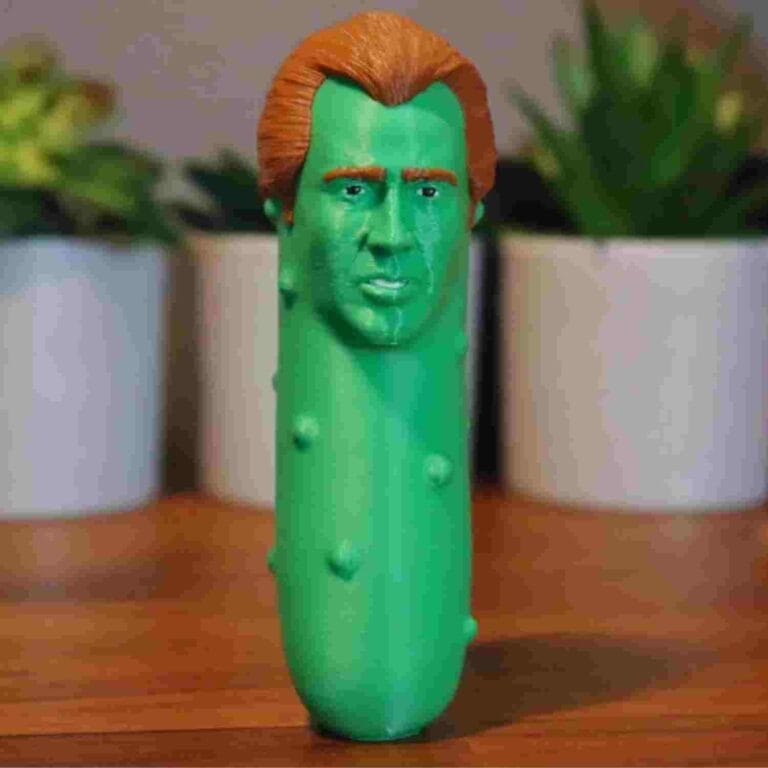 a gherkin with the face of Nicolas Cage