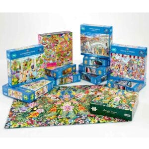 Stack of colourful jigsaw puzzle boxes – subscription gift idea for older woman