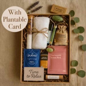 Letterbox gift set with bath salts, candle, and lotion — cozy pampering gift for older woman.